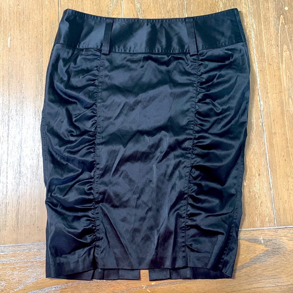 Black polyester skirt, size 5, slit in back with belt loop, zips w/clasp